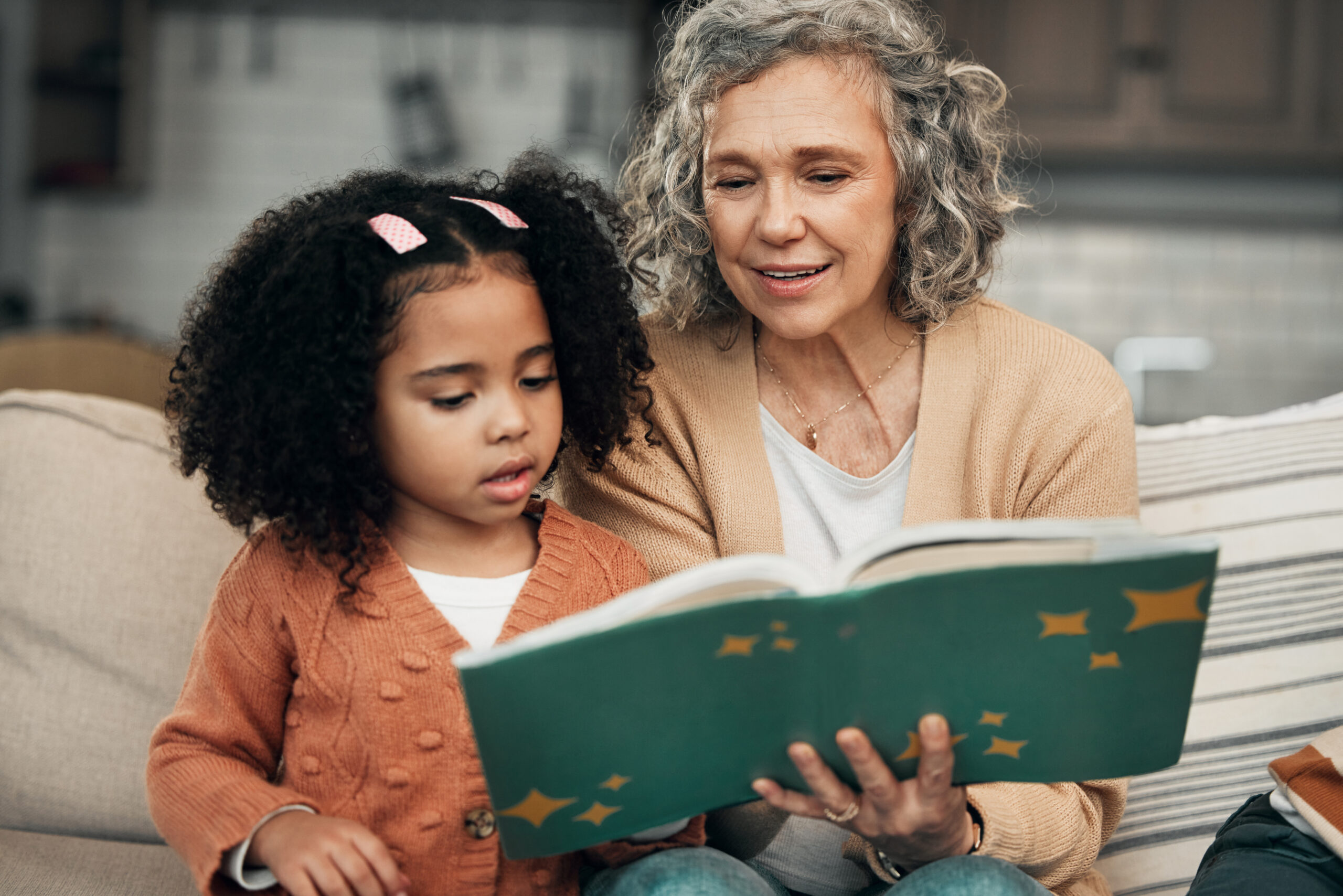 Grandmother reading to child