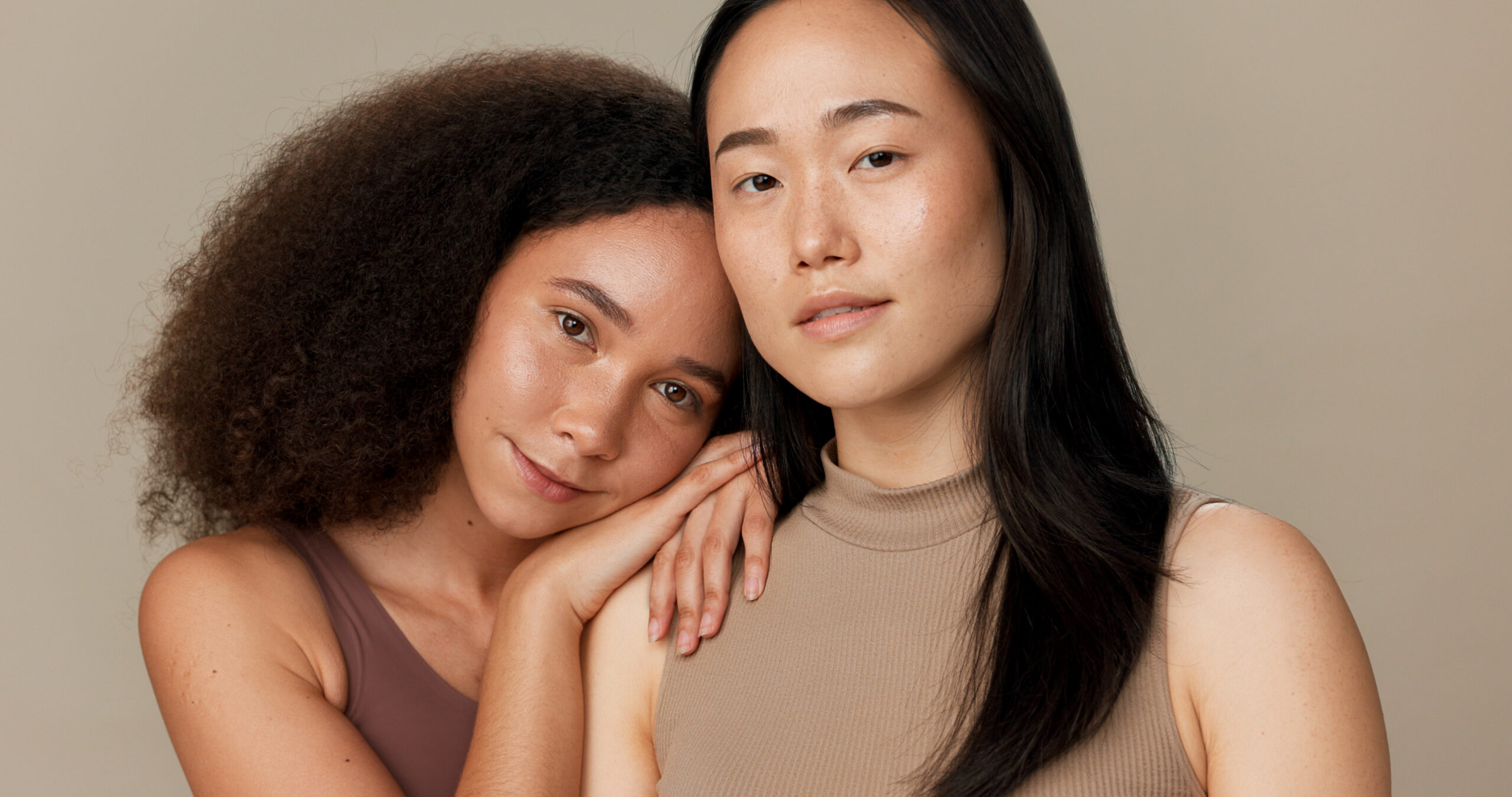 Two women standing side by side