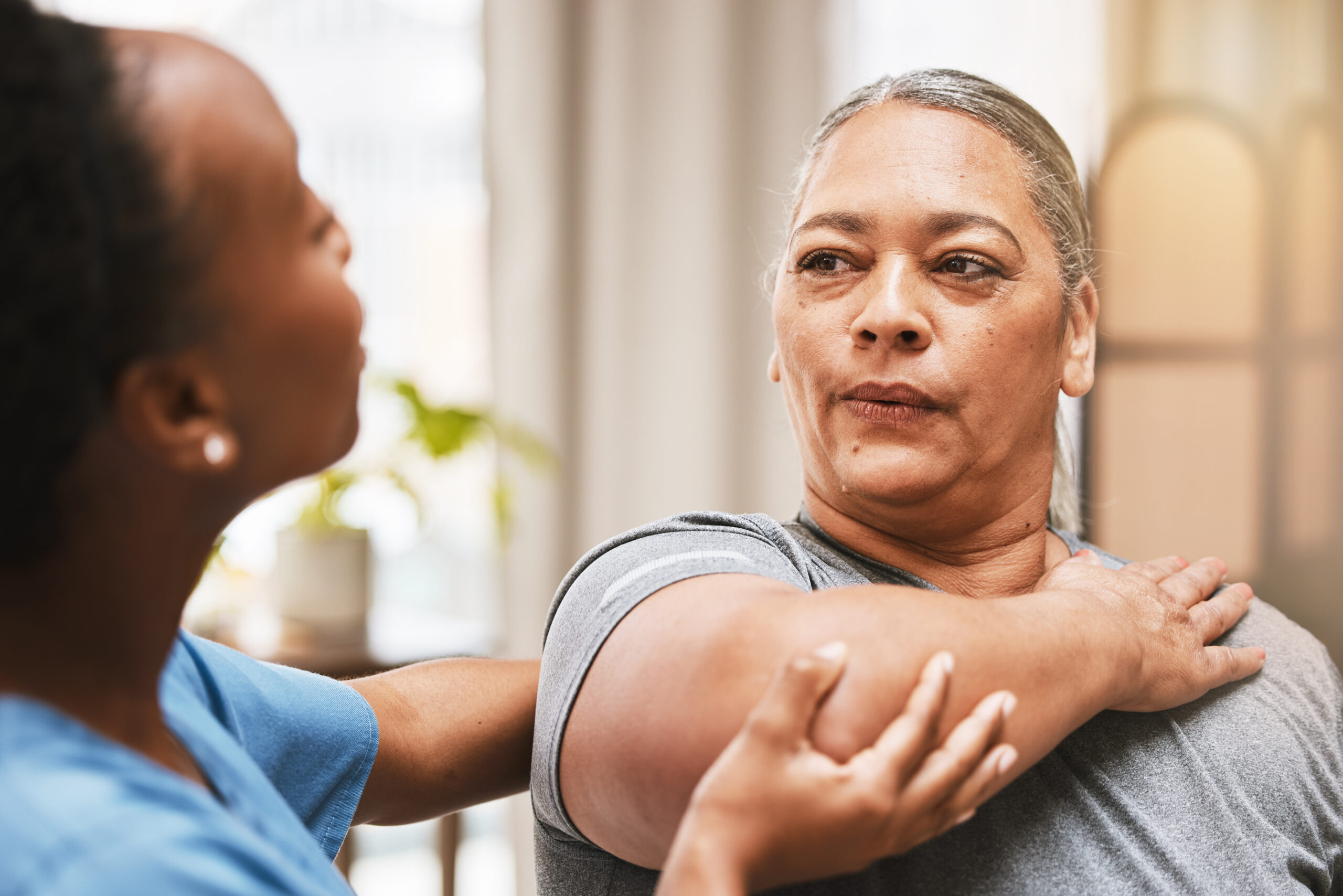 A female patient receiving physiotherapy