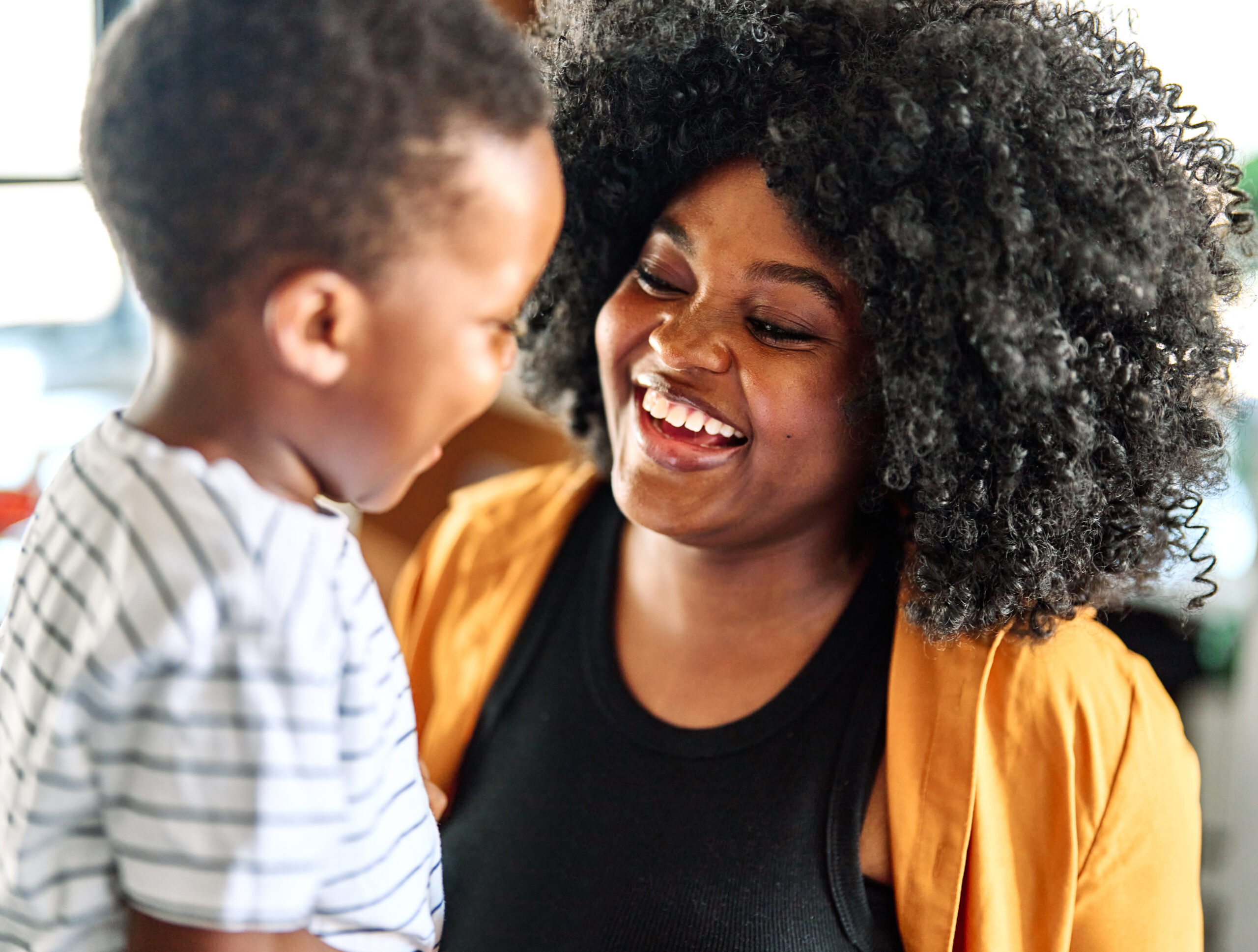 Mum laughing with her son