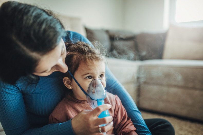 child with inhaler