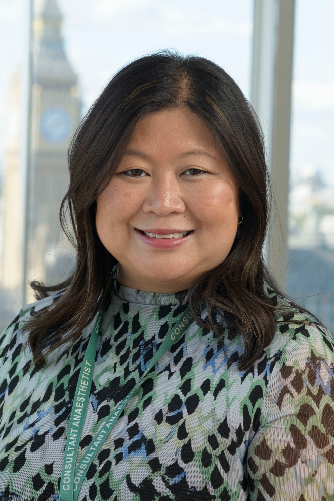 Brunette woman smiling for professional headshot