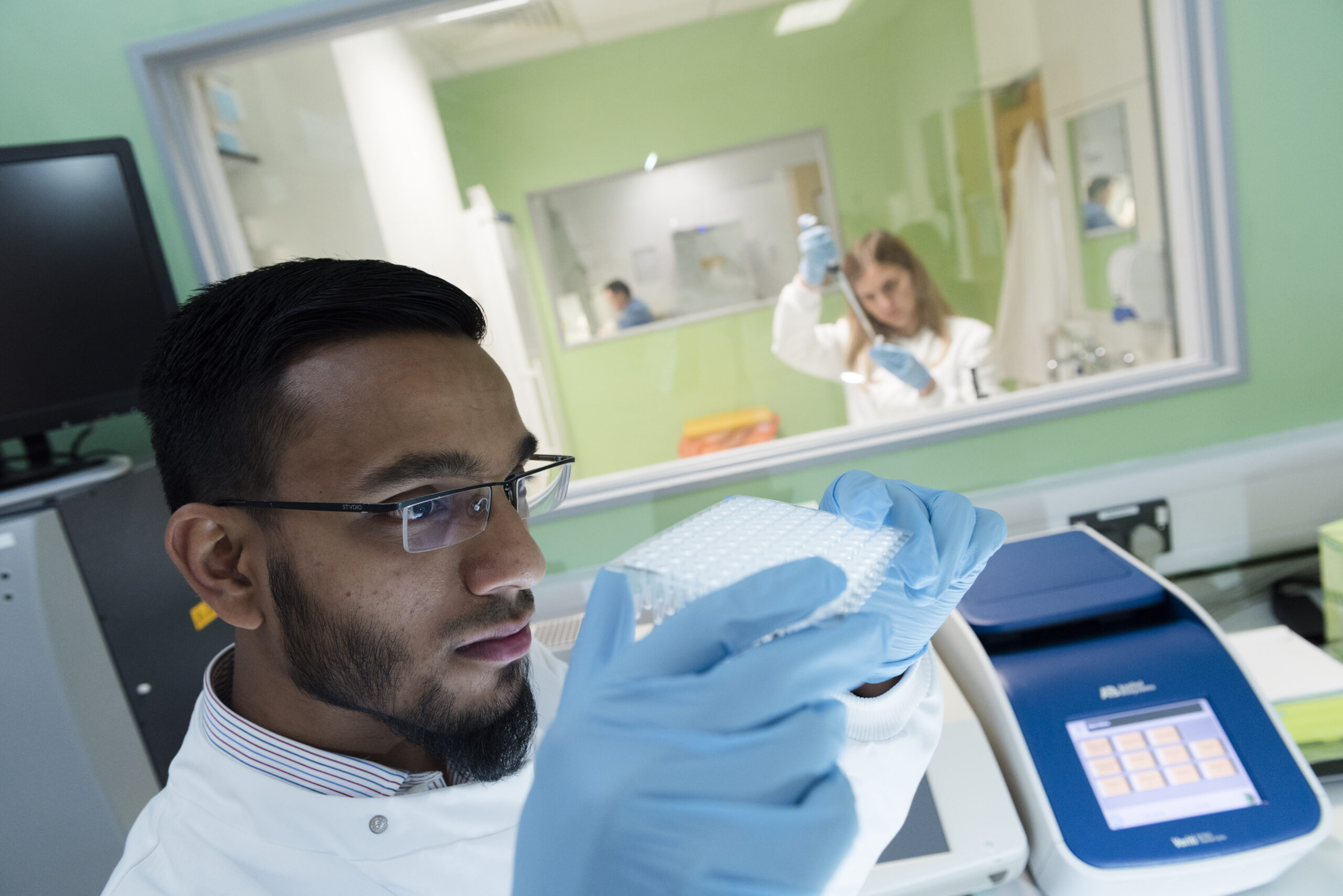 Genetics lab scientist working