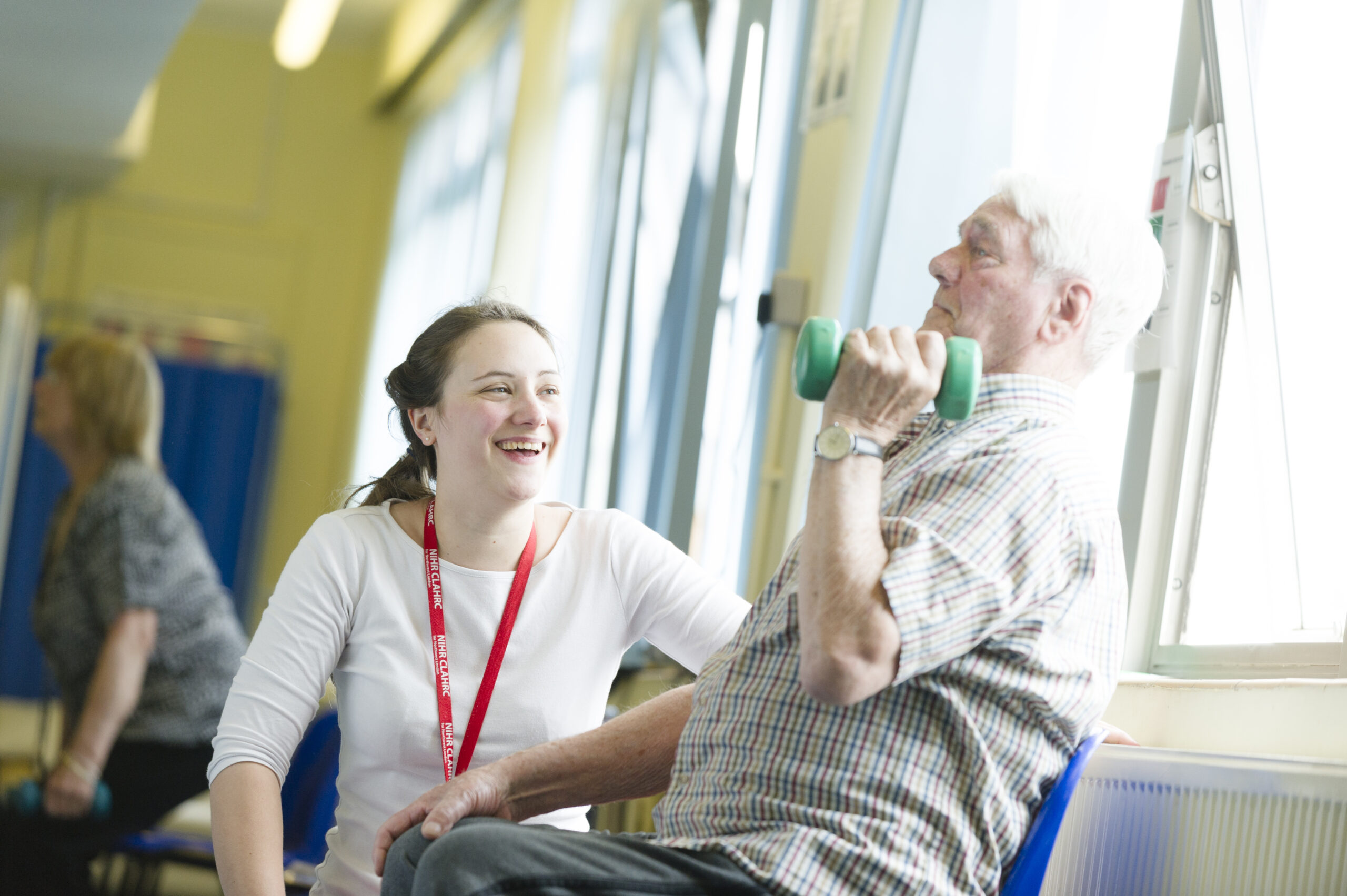 A physiotherapist with a patient