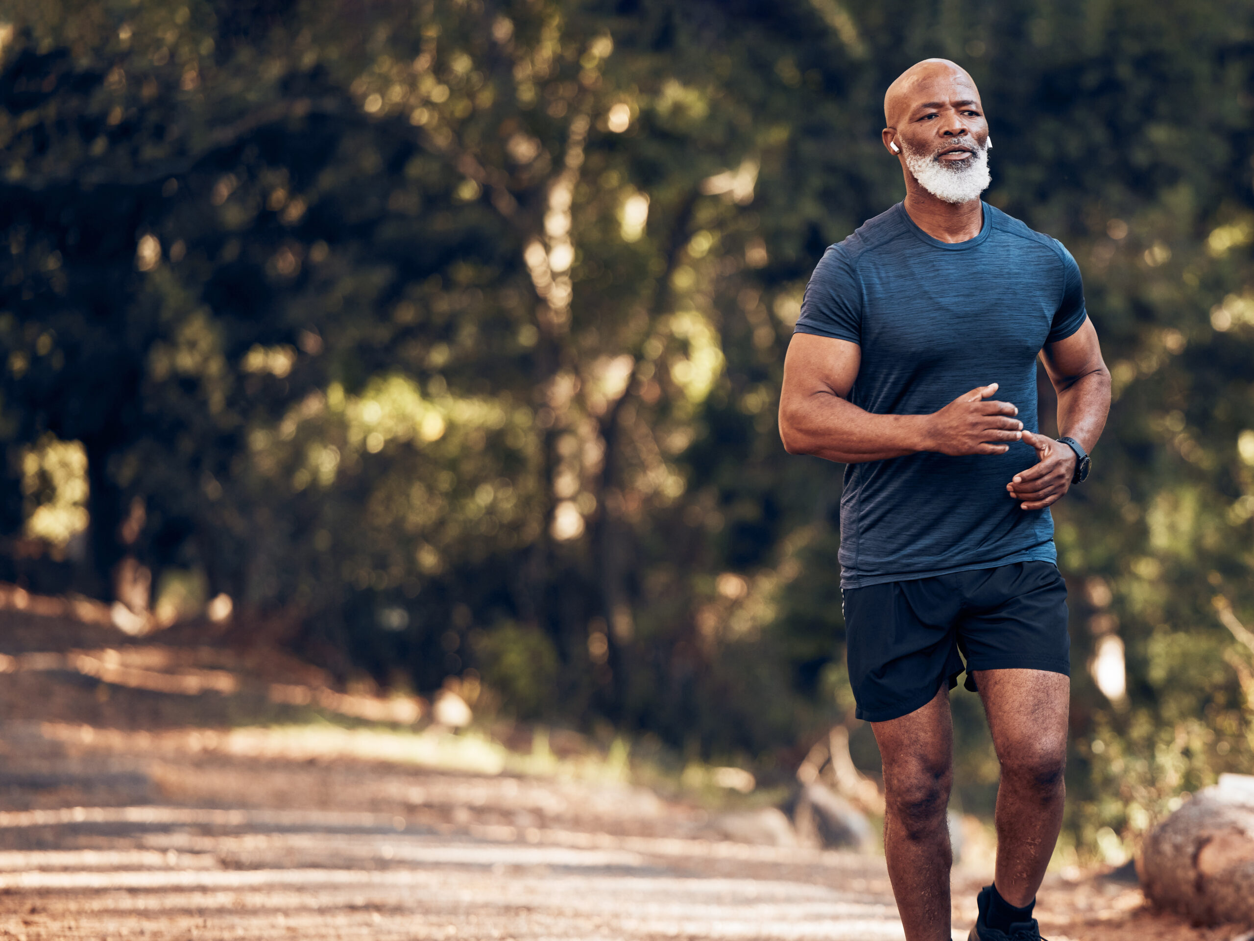 Mature man running outdoors