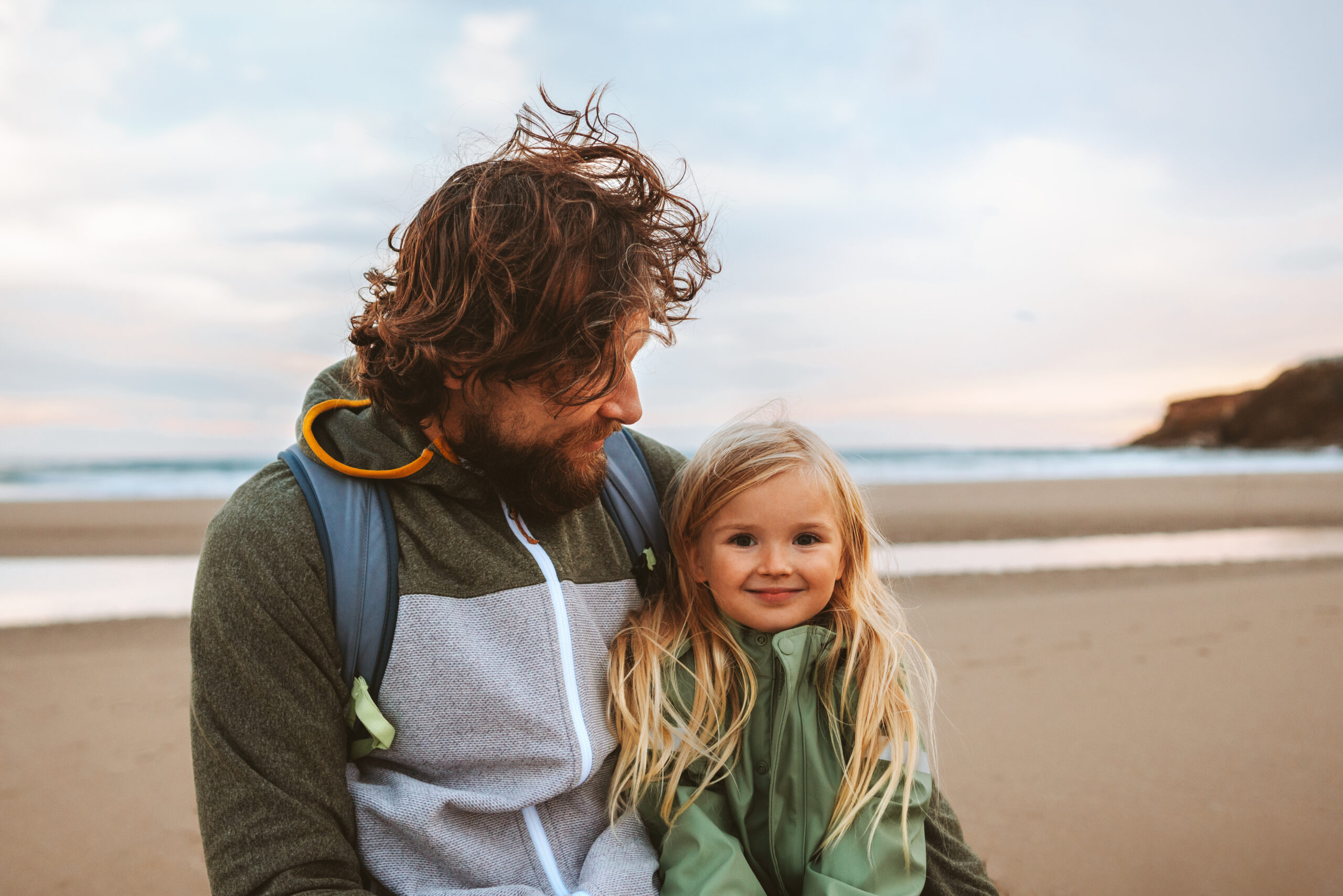 Dad with daughter at the beach