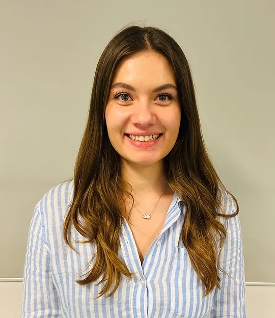 Smiling woman with long brunette hair