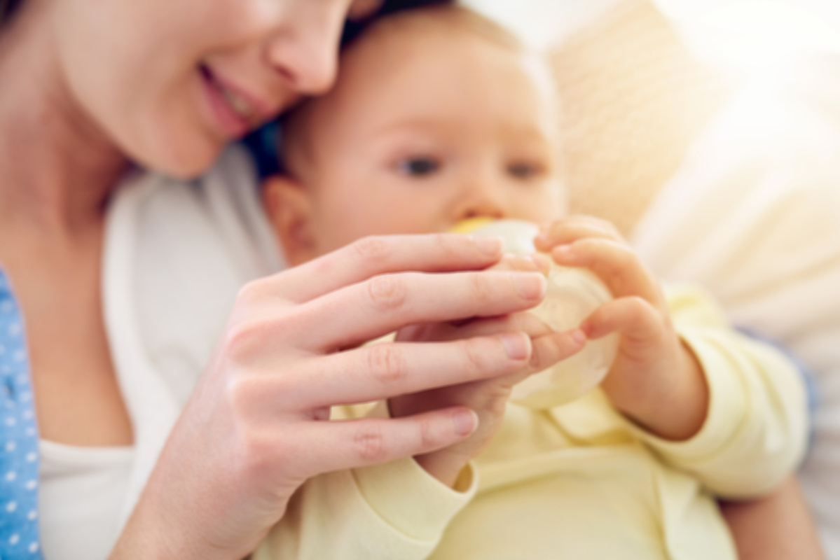 A mother feeding her baby