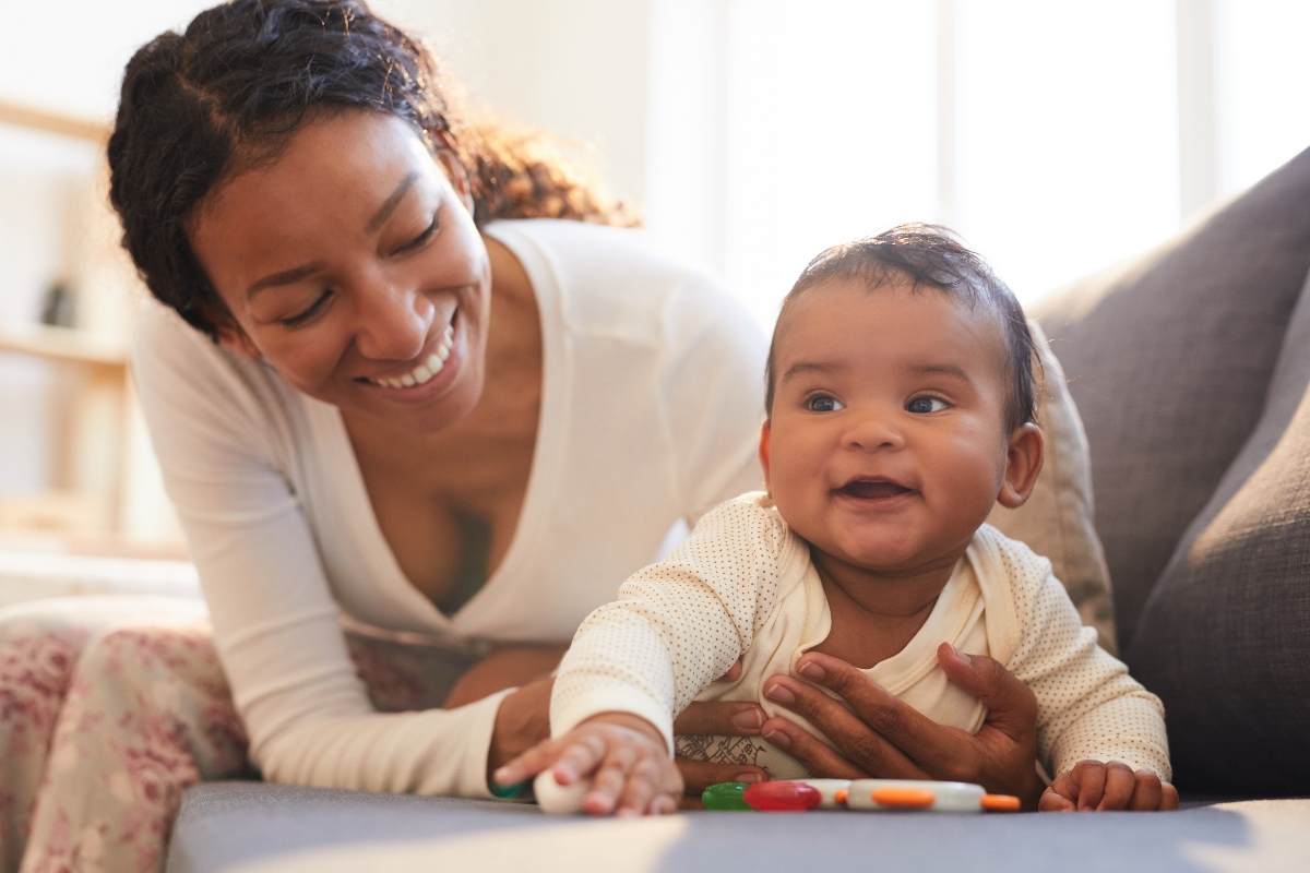 Mother and baby smiling